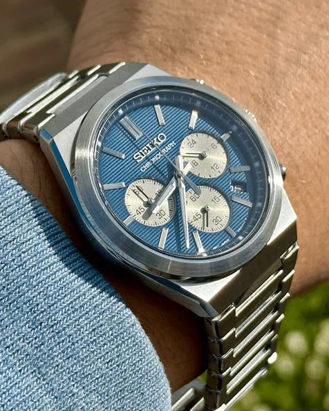 Close view of silver sub-dials and applied indices on blue dial