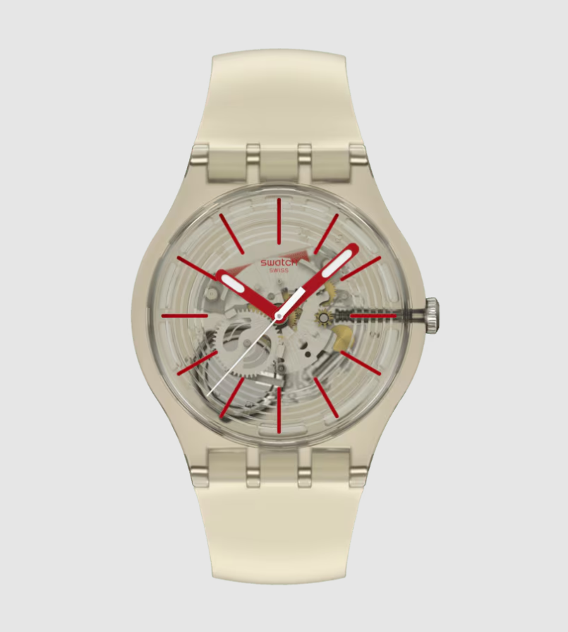 Swatch Revealed In The Sand quartz watch with 41mm beige bio-resin case, skeleton dial, red markers, and integrated bracelet