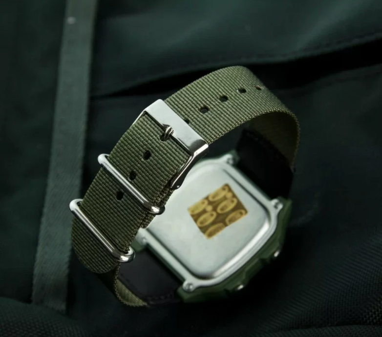 Casio AE-1200WHB-3B World Time Digital Quartz Watch Khaki Green Cloth Strap 10-Year Battery