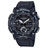 A black Casio G-Shock analog-digital watch with a textured black strap, black bezel, and silver accents, shown against a plain white background.
Cassimsandco.