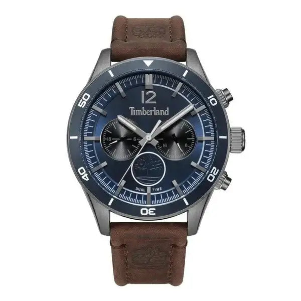 Timberland Ashmont TDWGF2230903 dual time quartz watch with blue dial, gunmetal stainless steel case, rotating bezel, and brown leather strap