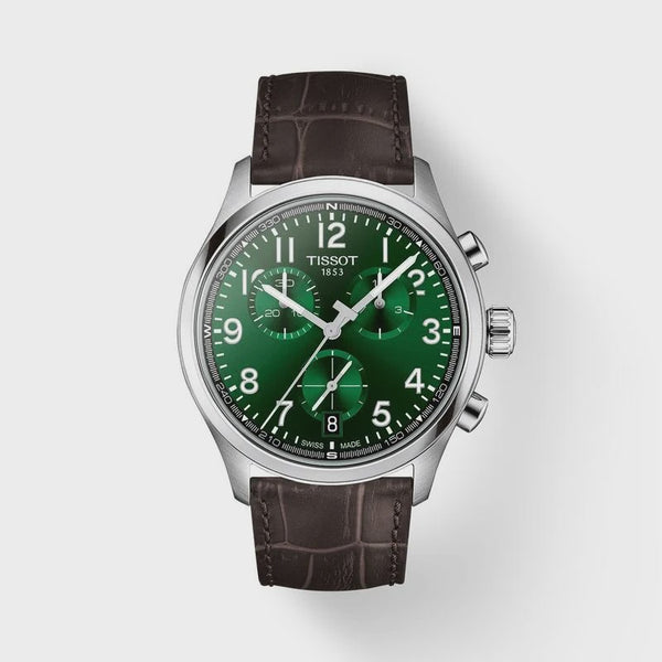 Tissot Chrono XL quartz chronograph watch with emerald green dial, 42mm stainless steel case, brown embossed leather strap, and sapphire crystal