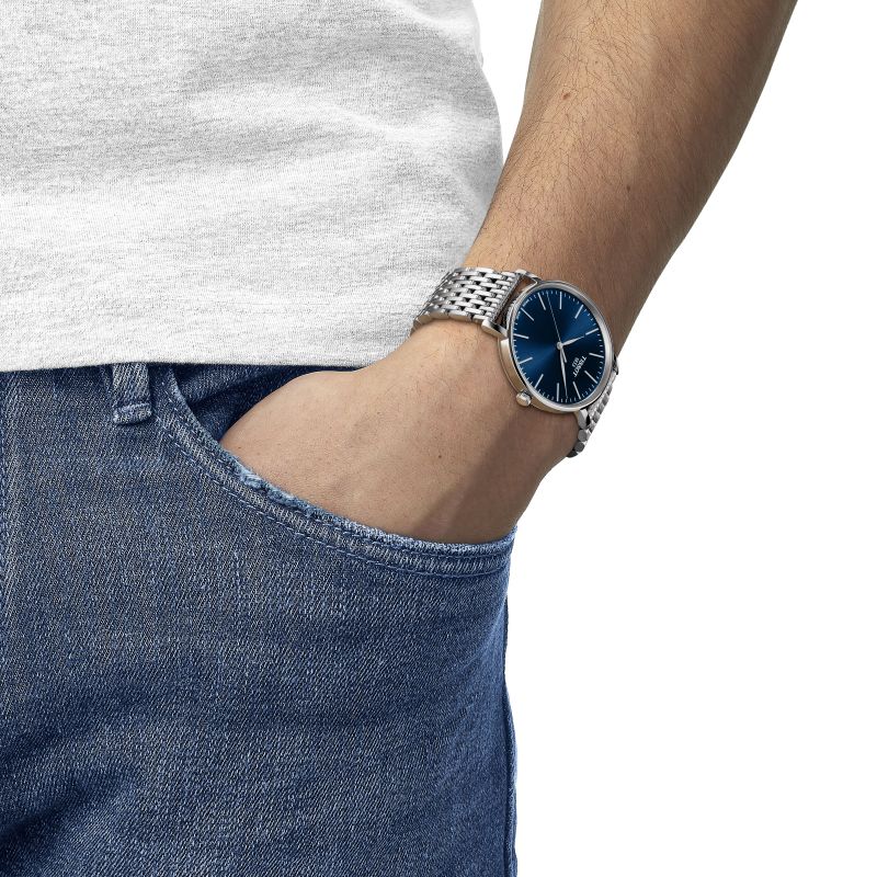 Tissot Everytime 40mm sapphire crystal and polished steel bezel detail