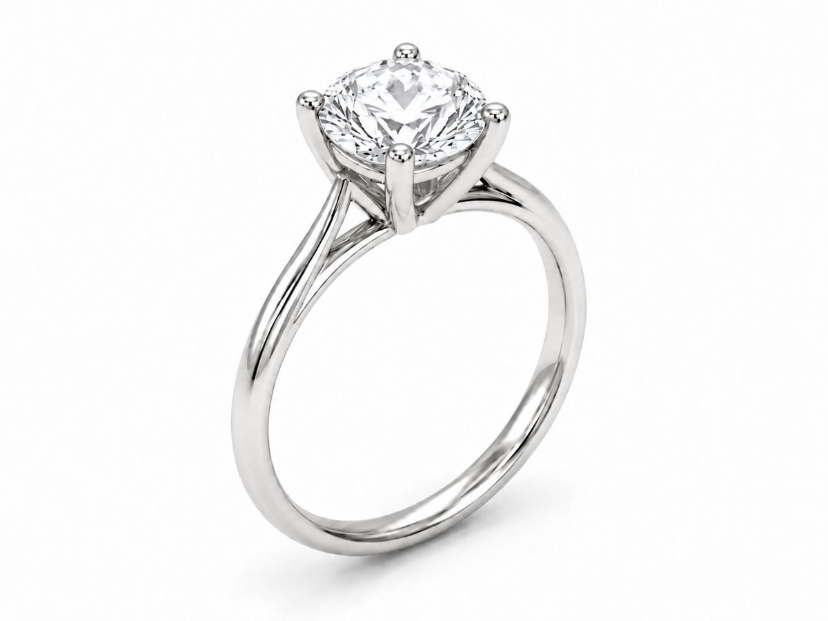 Side view of cathedral shoulders and open gallery on white gold solitaire ring