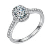 Oval cut moissanite halo engagement ring in sterling silver with pavé band by Cassim & Co Johannesburg