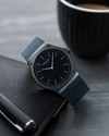 Obaku Net V316GXYLML Quartz Black Dial Blue PVD Mesh Bracelet Watch