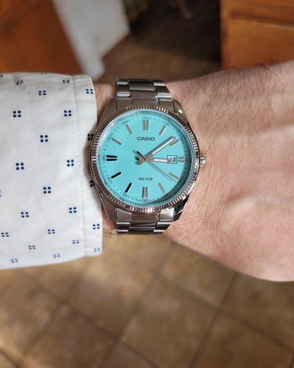 Casio MTP-1302PD Quartz Turquoise Blue Dial Stainless Steel Watch (MTP-1302PD-2A2VDF)