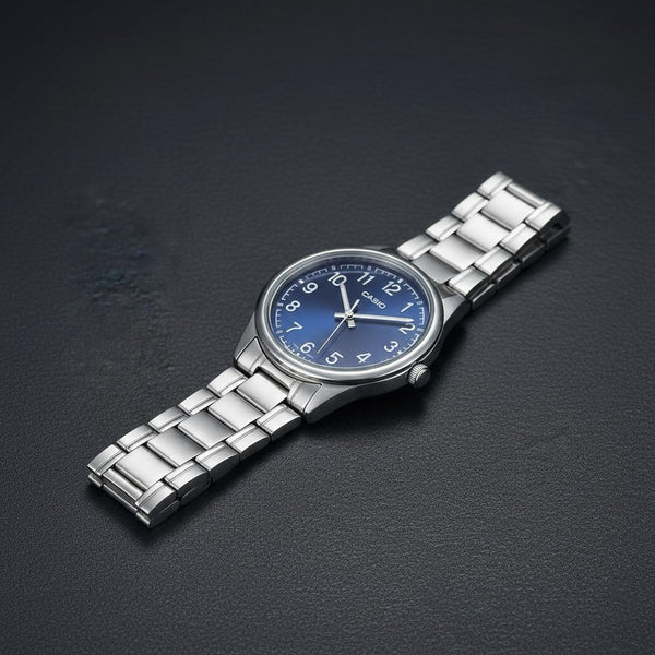 Cassims&Co. Casio quartz watch with a blue sunburst dial, white Arabic numerals, and a stainless steel bracelet.