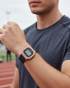 Cassims&Co. Casio Illuminator digital watch with a rose gold square case and black resin strap worn on a man's wrist.