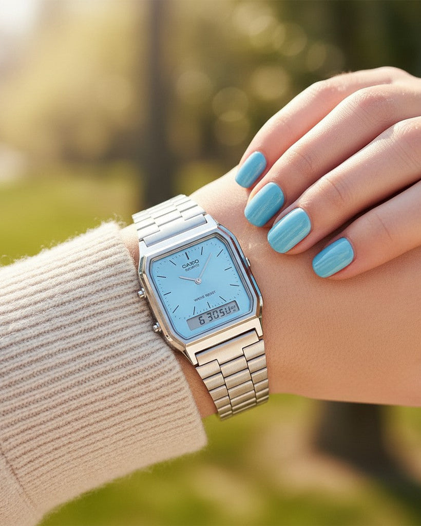 Cassims&Co. Casio Vintage Liberty ana-digi watch with a blue dial and stainless steel bracelet worn on a wrist.