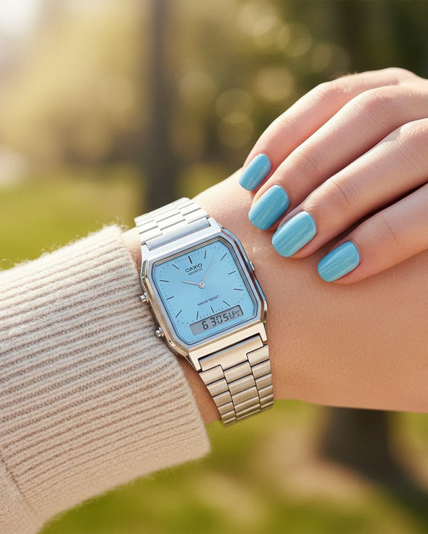 Cassims&Co. Casio Vintage Liberty ana-digi watch with a blue dial and stainless steel bracelet worn on a wrist.