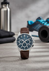 Cassims&Co. Daniel Klein chronograph watch with a blue sunburst dial and brown crocodile-embossed leather strap