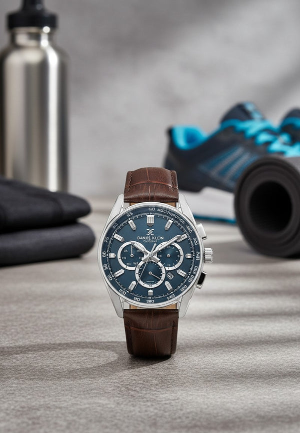 Cassims&Co. Daniel Klein chronograph watch with a blue sunburst dial and brown crocodile-embossed leather strap