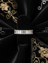 Cassims&Co. 9ct yellow gold eternity band featuring 2.03ct emerald cut lab grown diamonds in a four-prong setting.