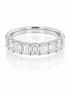 Cassims&Co. 9ct white gold eternity ring featuring nine emerald-cut lab grown diamonds in a prong setting.