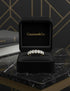 Cassims&Co. 9ct yellow gold seven-stone oval lab grown diamond ring displayed in a black velvet jewellery box.