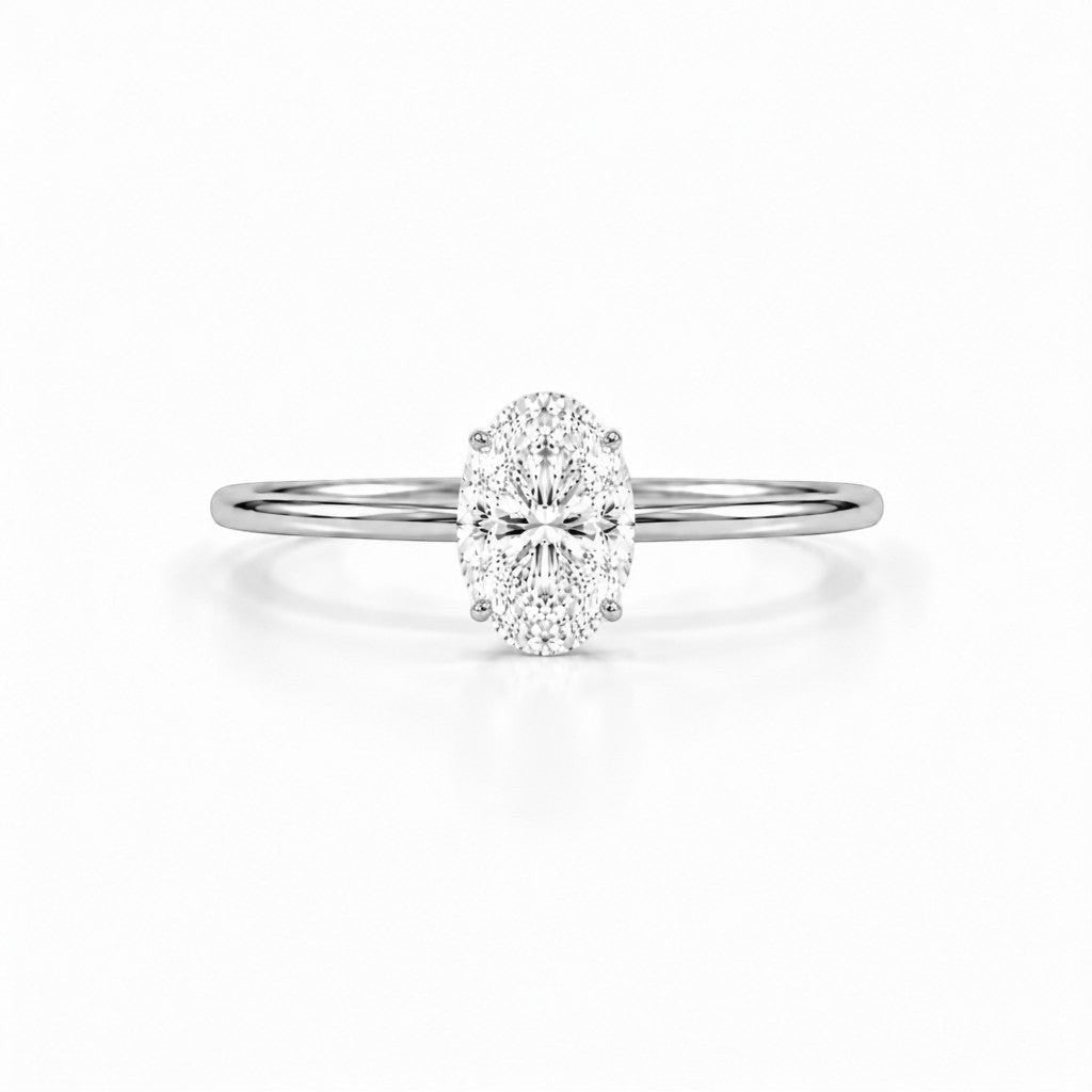 Cassims&Co. 9ct white gold engagement ring featuring a 1.00ct oval lab grown diamond in a classic four-prong setting.