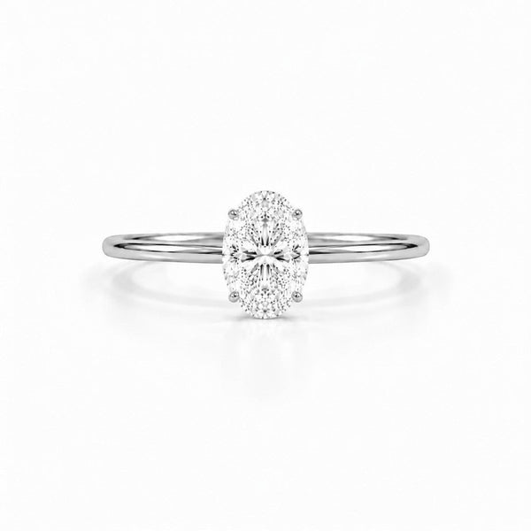 Cassims&Co. 9ct white gold engagement ring featuring a 1.00ct oval lab grown diamond in a classic four-prong setting.