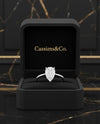 Cassims&Co. 1.58ct pear-shaped lab grown diamond solitaire engagement ring in 9ct white gold inside a black box.