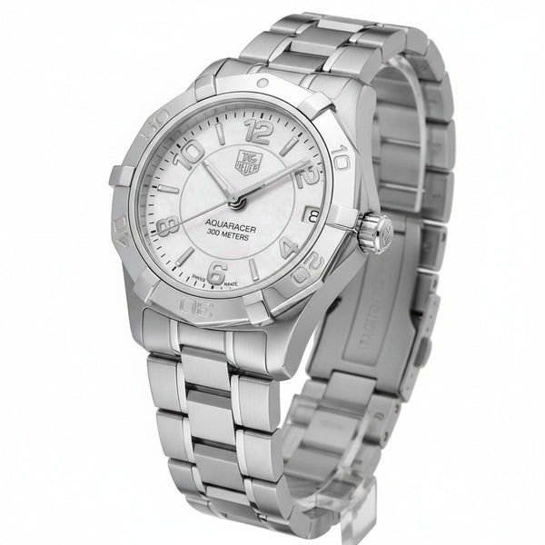 Cassims&Co. pre-owned TAG Heuer Aquaracer ladies watch with a white mother-of-pearl dial and stainless steel bracelet.