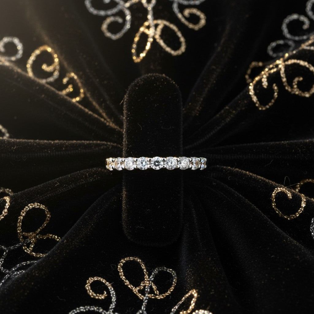 Cassims&Co. 9ct white gold eternity ring featuring a continuous row of brilliant lab grown diamonds in prong settings.