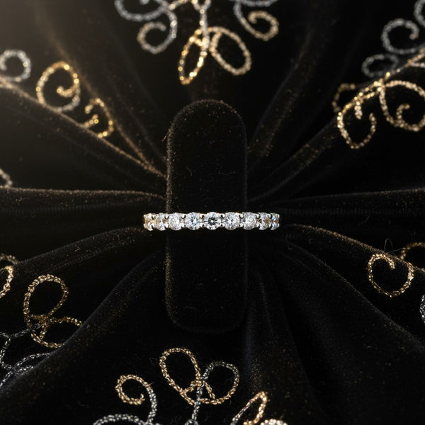 Cassims&Co. 9ct white gold eternity ring featuring a continuous row of brilliant lab grown diamonds in prong settings.