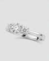 Cassims&Co. 9ct white gold three stone engagement ring featuring a 1.05ct lab grown diamond center and side stones.