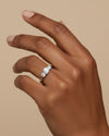 Cassims&Co. 9ct white gold three stone lab grown diamond engagement ring worn on a hand