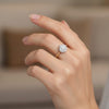 Cassims&Co. 9ct yellow gold engagement ring featuring a sparkling diamond flower cluster on a delicate band.