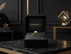 Cassims&Co. 9ct yellow gold solitaire engagement ring with a 1.5ct round lab grown diamond in a black velvet box