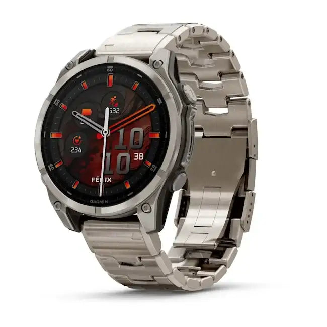 Garmin Fenix 8 AMOLED Sapphire 47mm titanium multisport GPS smartwatch with vented titanium bracelet showing red digital display