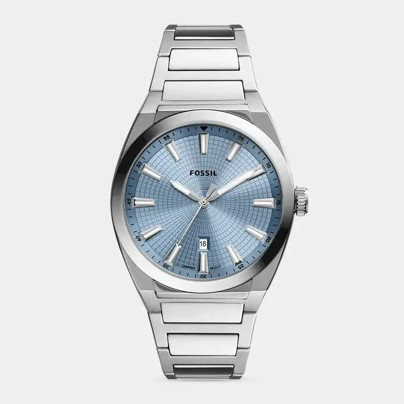 Fossil Everett Sport FS5986 quartz watch with blue sunburst guilloché dial and integrated stainless steel bracelet on white background