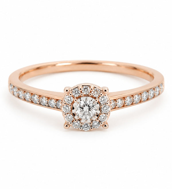 9ct rose gold diamond halo engagement ring with round centre stone and pavé band by Cassim & Co Johannesburg