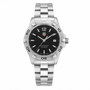 Pre-owned TAG Heuer Aquaracer WAF1410 ladies quartz dive watch with black dial and stainless steel bracelet on white background