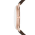 Rose gold-tone stainless steel case profile and leather strap with buckle clasp