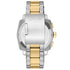 Side profile of 44mm round case with knurled gold-tone bezel and crown