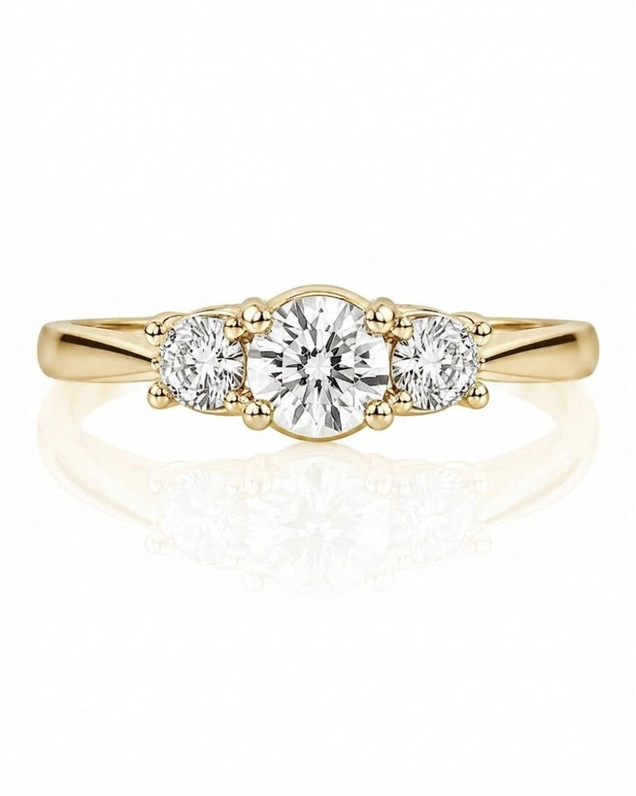 9ct yellow gold three stone engagement ring with 1.05ct lab grown round diamonds in claw setting