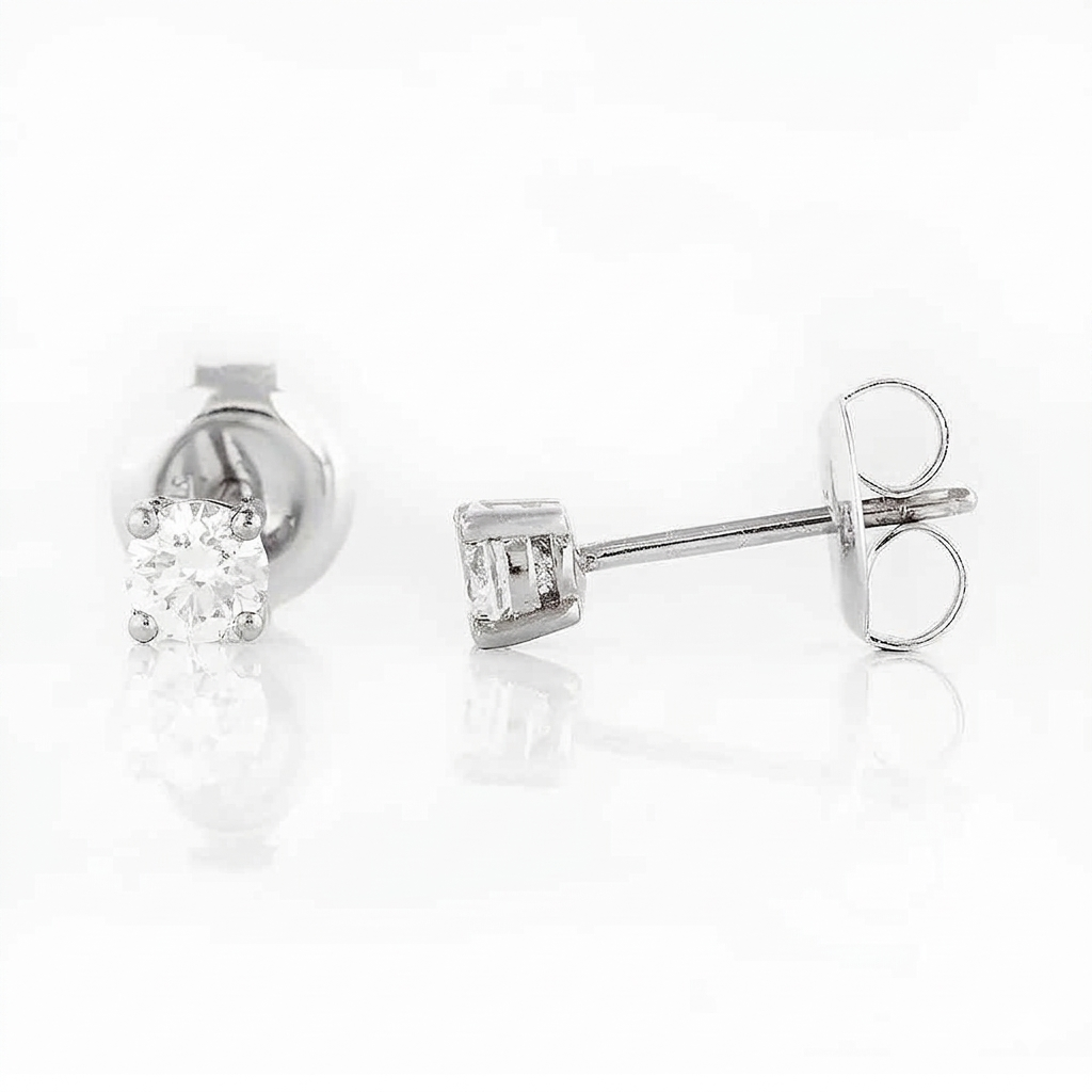 9ct white gold stud earrings with lab grown diamonds totalling 0.27ct in four-claw settings with butterfly backs