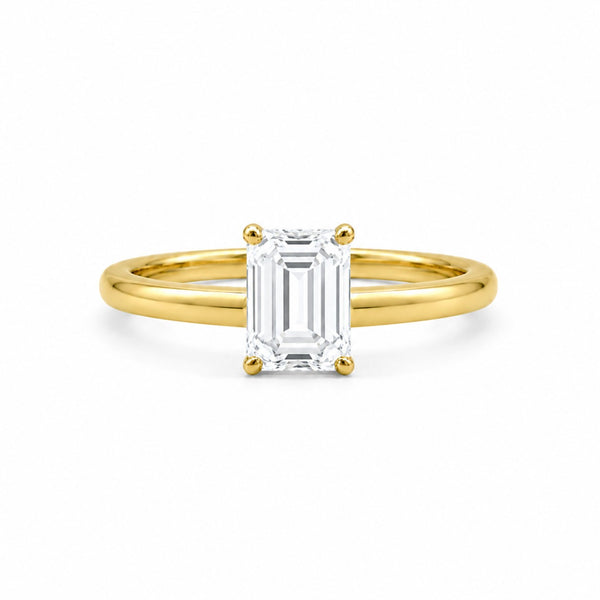 9ct yellow gold solitaire engagement ring with 1.00ct emerald-cut lab grown diamond in four-claw setting by Cassim & Co Johannesburg
