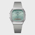 Casio AQ-240E-2ADF anadigi quartz watch with gradient green dial, cushion stainless steel case, and integrated three-link bracelet