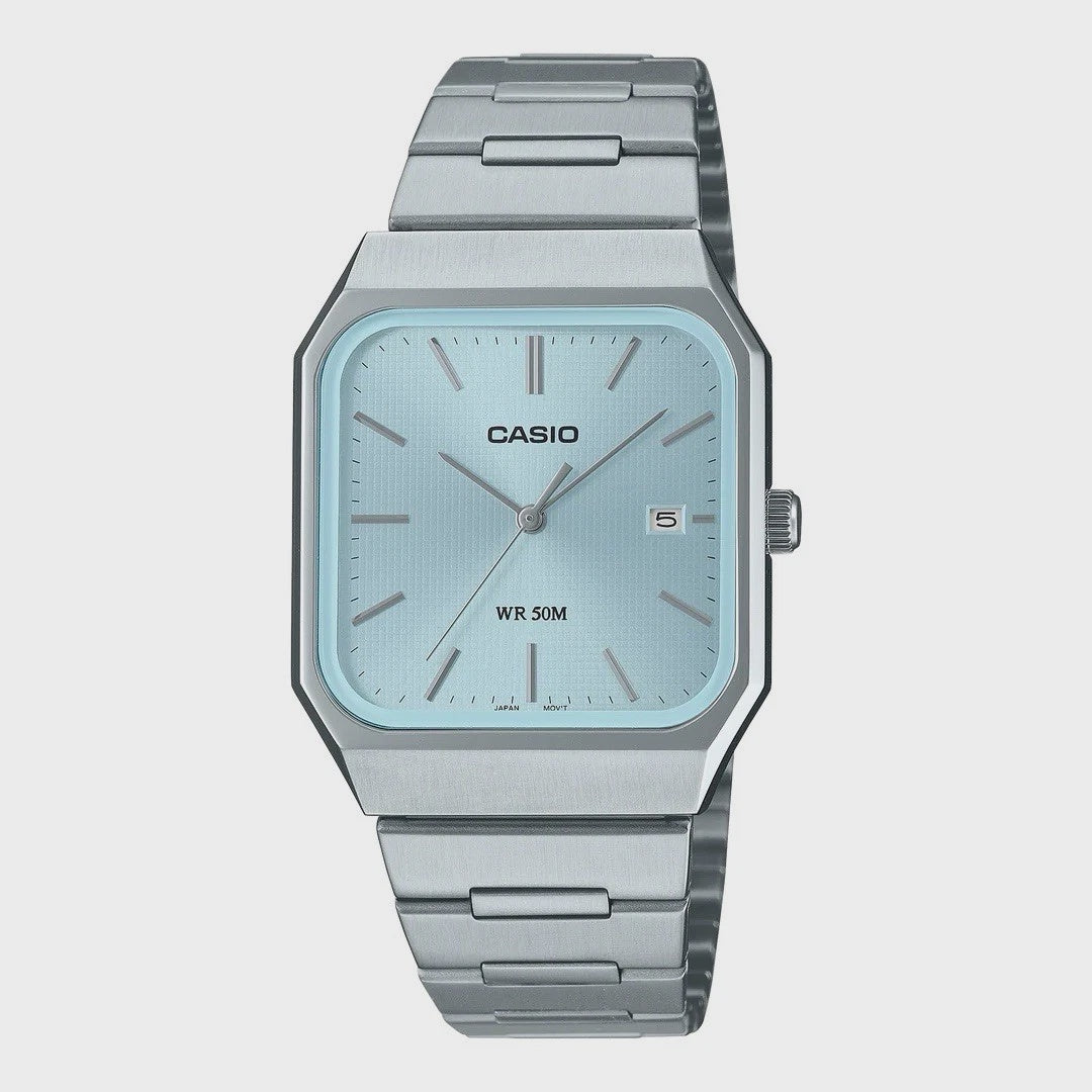 Casio MTP-B185D quartz analogue watch with blue textured dial, squared cushion stainless steel case, and integrated metal bracelet