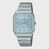 Casio MTP-B185D quartz analogue watch with blue textured dial, squared cushion stainless steel case, and integrated metal bracelet