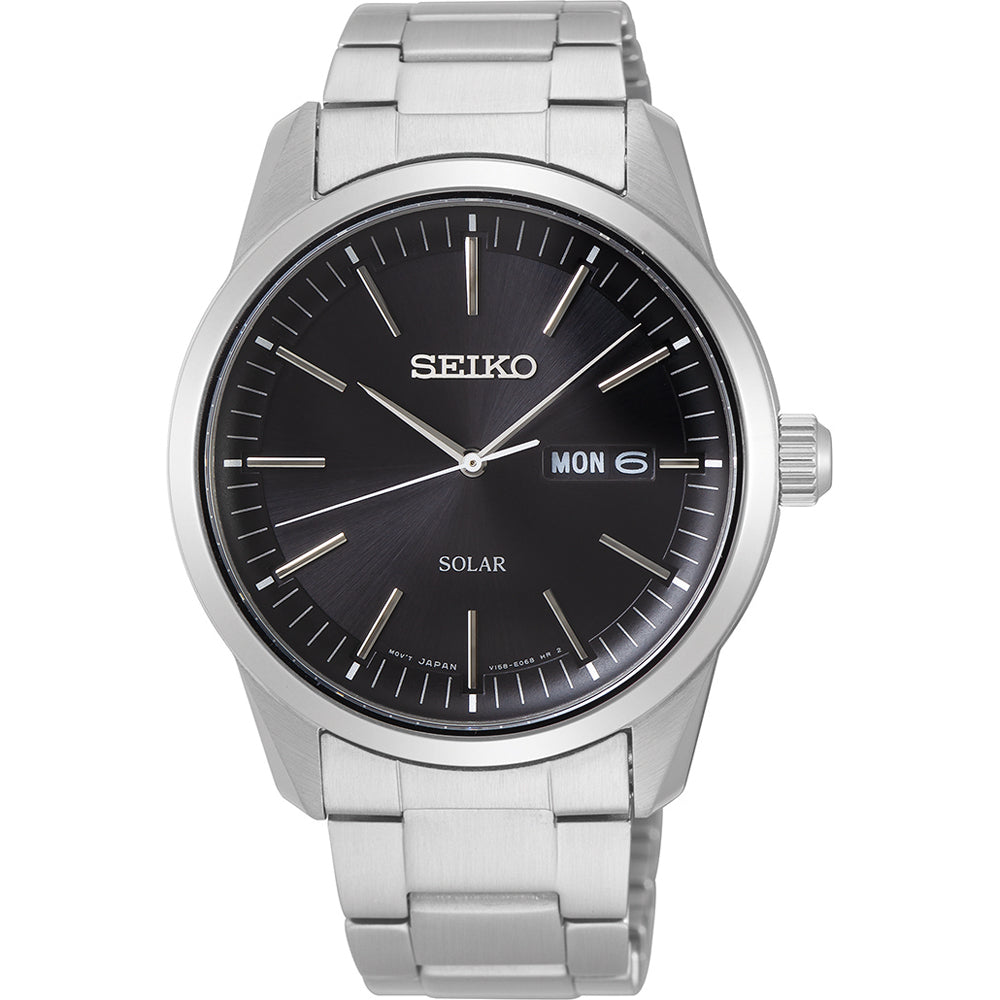 Seiko SNE527P1 solar-powered watch with black sunburst dial, stainless steel case and bracelet, sapphire crystal, and day-date display