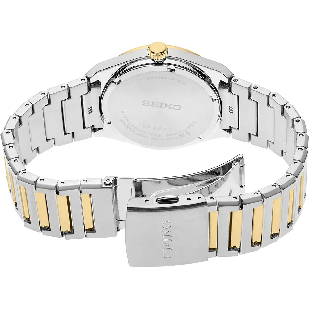 Side profile of the 38.9mm round two-tone steel case