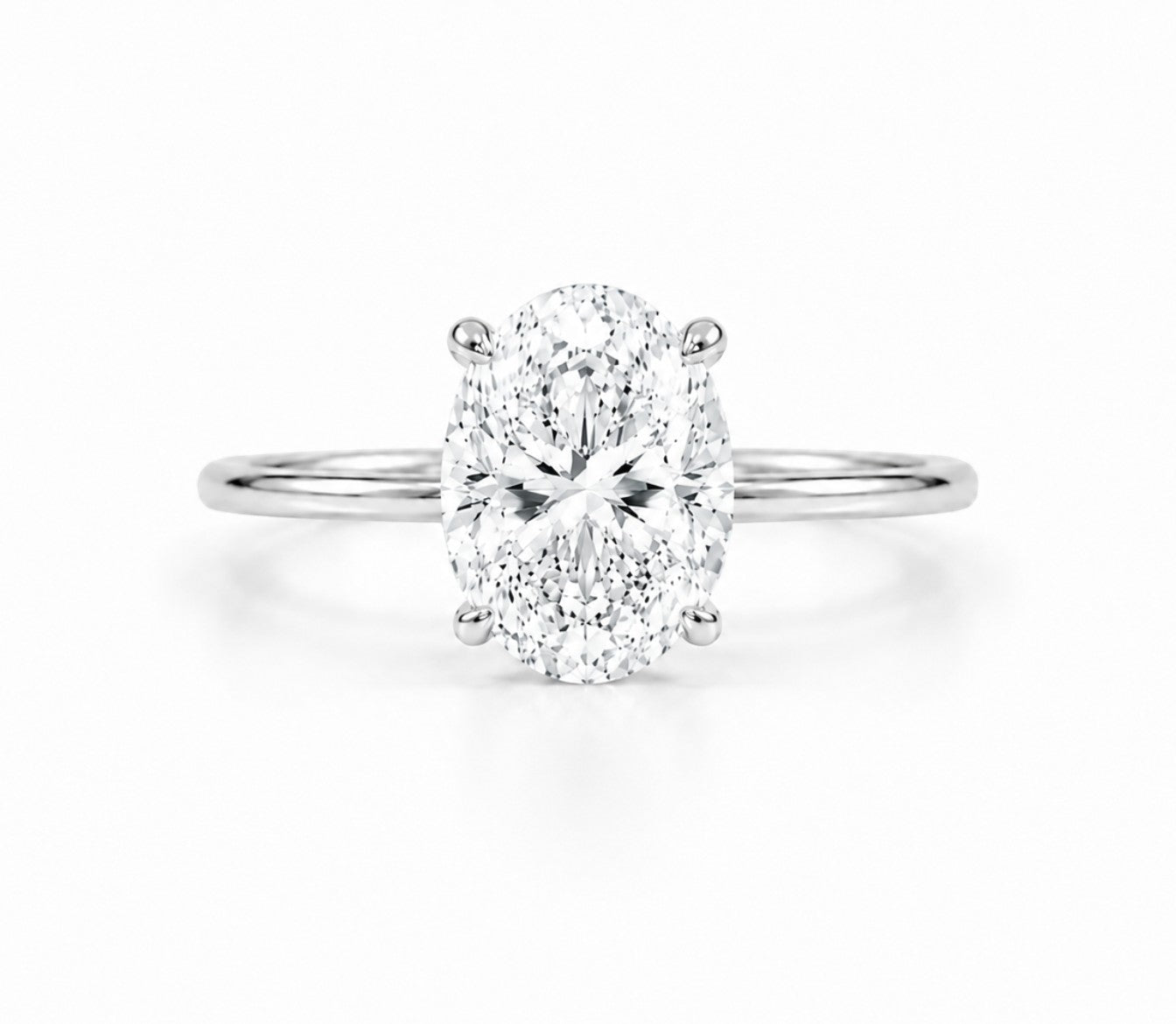 9ct white gold 2ct oval lab grown diamond solitaire engagement ring with four claw setting on white background