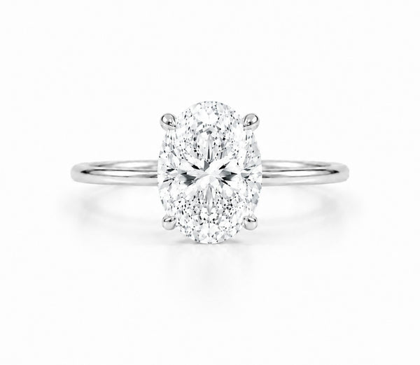 9ct white gold 2ct oval lab grown diamond solitaire engagement ring with four claw setting on white background