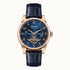 Ingersoll The Swing I12702 automatic watch with open heart blue dial, rose gold stainless steel case, and navy blue leather strap