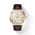 Tissot Classic Dream T129.410.26.263.00 two-tone quartz watch with cream Roman numeral dial and brown embossed leather strap on white background