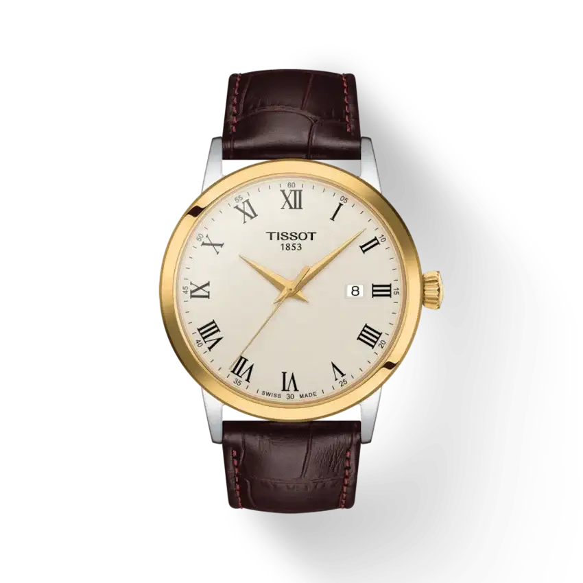 Tissot Classic Dream T129.410.26.263.00 two-tone quartz watch with cream Roman numeral dial and brown embossed leather strap on white background