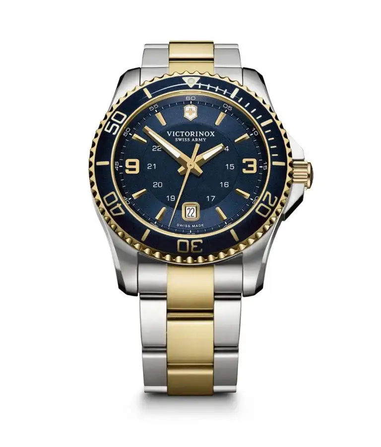 Victorinox Maverick 241789 Swiss quartz watch with blue dial, two-tone stainless steel and gold PVD case, rotating bezel, and integrated bracelet